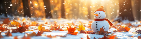 Snowman built from the first winter snow in colorful autumn leaves in the forest. Concept of winter coming and autumn leaving.の素材
