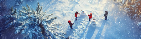 Aerial view of children building snowman in winter forest with snow covered surface, spruce trees and sunset in the background.の素材