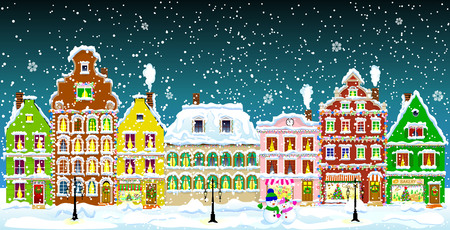 City street in the winter night. Christmas Eve. Winter holiday. Houses in winter night. Snow on a city street. Decoration houses on winter holidays.のイラスト素材