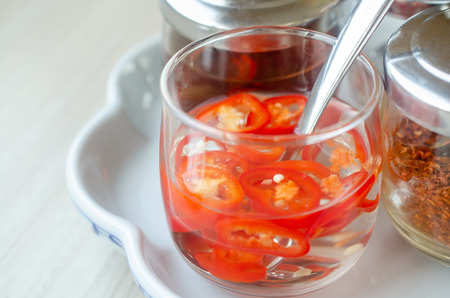 Red Chilli in Vinegar. Thai food seasoning. Sour and Spicyの写真素材