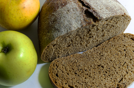 apples black bread on the table