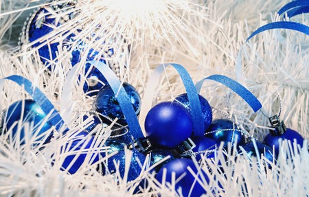 Christmas Toys balls on white decoration with Bengal lights.の写真素材