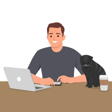Man working at the table with a cat and coffee on the table. Flat vector illustration isolated on white backgroundのイラスト素材