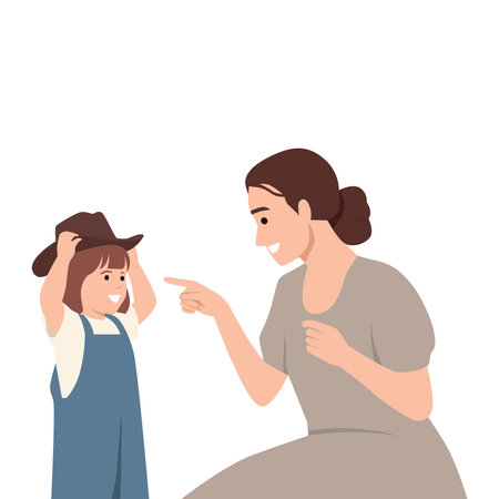 Mother points playfully at her daughter, who beams with joy while trying on a cowboy hat. Flat vector illustration isolated on white backgroundのイラスト素材