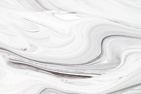 Mix of a white and black paint, closeup の写真素材