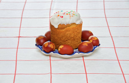 Easter cake in the saucer and the  eggs 
