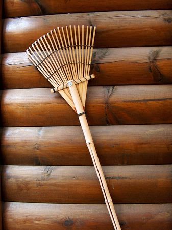 Wood broom hanging on wood huntの写真素材