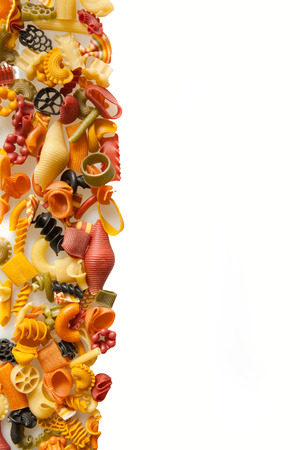 colorful pasta mix isolated on whiteの写真素材