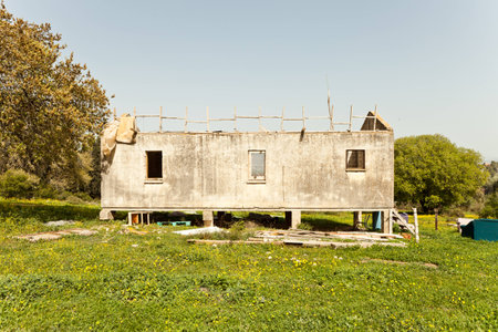 Abandoned house in the middle of a field の写真素材