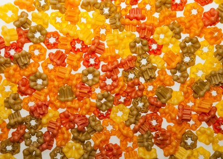 Fiori Flower shaped pasta in four colours backgroundの写真素材