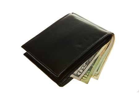 Black leather wallet with dollar notes の写真素材