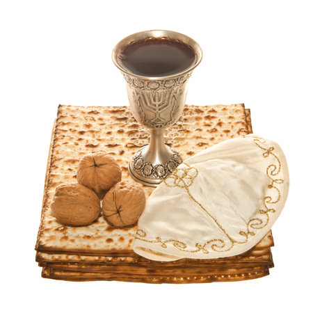 Matzoth, silver Kiddush cup three walnuts and Yarmulke for Passover Seder の写真素材