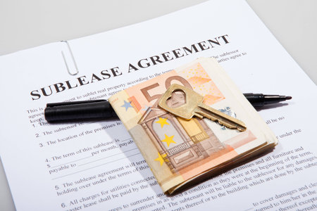 Sublease agreement with Euro notes golden key and penの写真素材