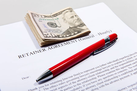 Retainer Agreement with Dollars and penの写真素材