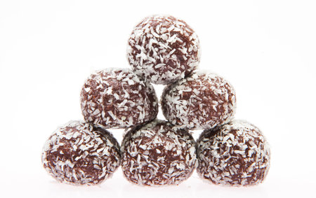 Stack of Chocolate balls with coconut flakesの写真素材