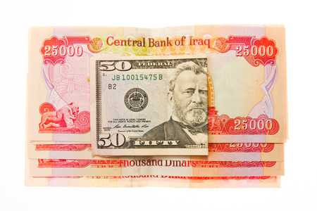 Iraqi Dinars and American Dollarの写真素材