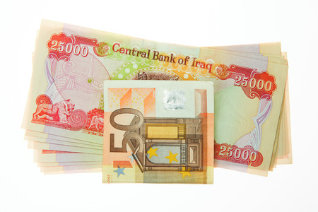 Iraqi Dinars and fifty Euro Noteの写真素材