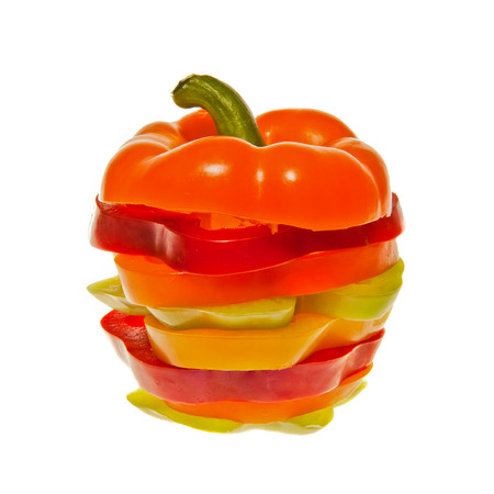 Stack of Sliced Red Yellow Green and orange bell peppers