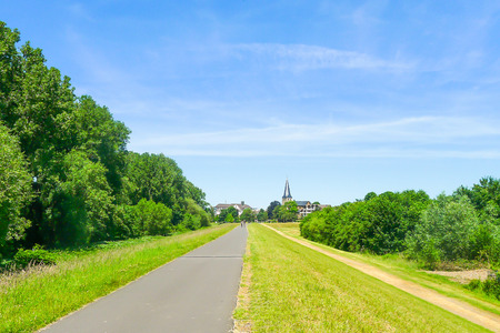 European country road with blue skyの写真素材