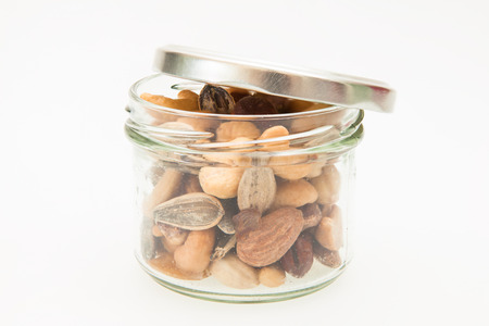 mixed nuts with jarの写真素材