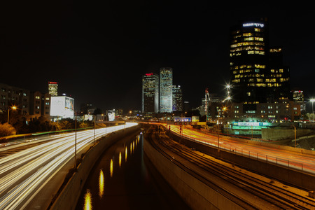 Tel Aviv skyline photo at night with traffic