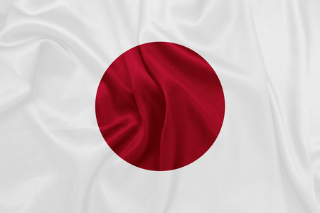 Japan - Waving national flag on silk textureの写真素材