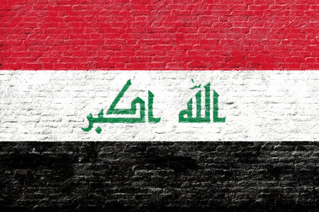 Iraq - National flag on Brick wallの写真素材