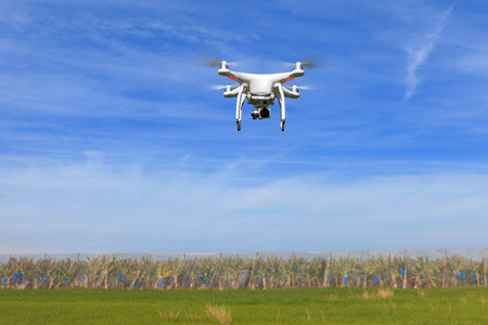 White drone equipped with high resolution 4K video cameraの写真素材