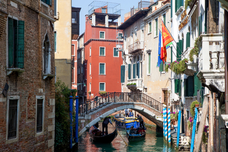 Gondolier and Gondola at Venice grand canalのeditorial素材