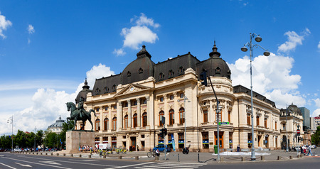 Central University Library and King Carol's statue in Bucharestのeditorial素材