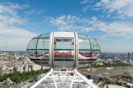 London eye capsules with a view of Central Londonのeditorial素材