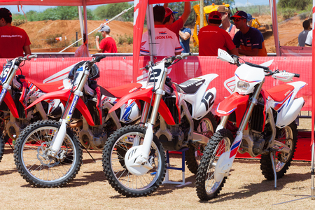 Team Honda Motocross bikes paddock and service spot. hours before the race starts.のeditorial素材
