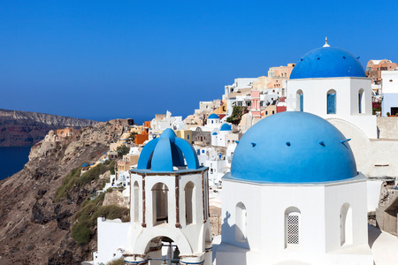 White houses and blue domes of Oia, Santorini.の写真素材