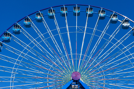 Ferris wheel with blue sky in the backgroundの写真素材