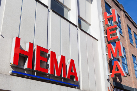 Hema sign.Hema is a Dutch discount retail chain that started life as a dimestore. Hema has been owned by the British investment firm Lion Capital.のeditorial素材