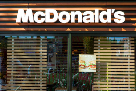McDonald's sign, McDonald's is the world's largest chain of hamburger fast food restaurants, serving around 68 million customers daily in 119 countriesのeditorial素材