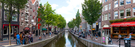 Panoramic view of the Red light district of Amsterdam and the main street and canal.のeditorial素材