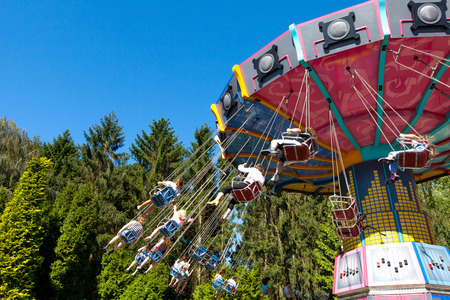 High speed carousel with park visitors during a ride at Walibi theme park.のeditorial素材