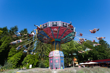 High speed carousel with park visitors during a ride at Walibi theme park.のeditorial素材