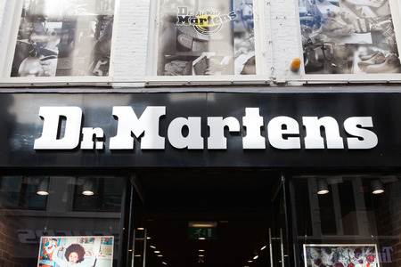 Dr.Martens logo and store front. Dr. Martens is a British footwear and clothing brand, which also makes a range of accessoriesのeditorial素材