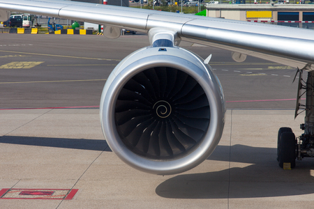 Jet engine and airplane wingの写真素材