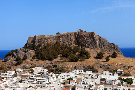 Lindos acropolis with the white houses of Lindosの写真素材