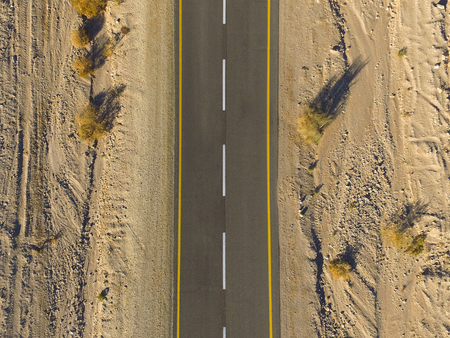 Empty desert road Top down viewの写真素材