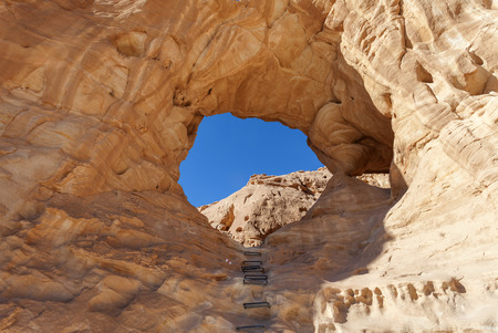 Timna park - The big arch with Desert landscape viewの写真素材
