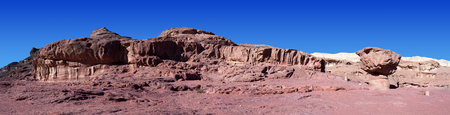 Timna park - Panoramic view of the Mushroom, surrounded by copper ore smelting sites from between the 14th and 12th centuries BCEの写真素材