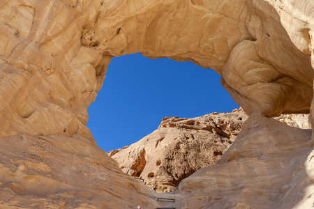Timna park - The big arch with Desert landscape viewの写真素材