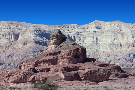 Timna park - Mount Screw with desert mountains and blue sky in the backgroundの写真素材