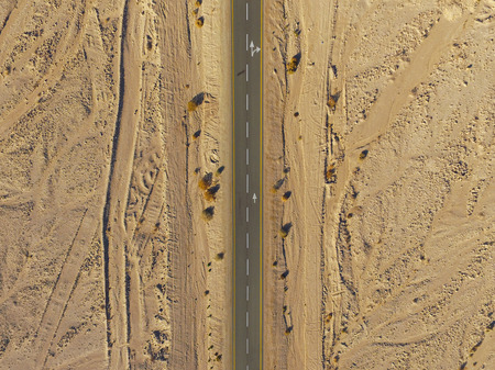 Empty desert road Top down viewの写真素材