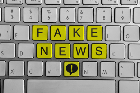White keyboard with Fake news buttonsの写真素材