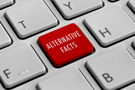 White keyboard with red Alternative facts buttonの写真素材